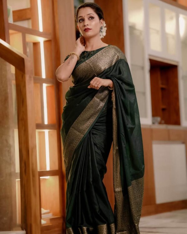 Appealing Dark Green Soft Silk Saree With Scrumptious Blouse Piece
